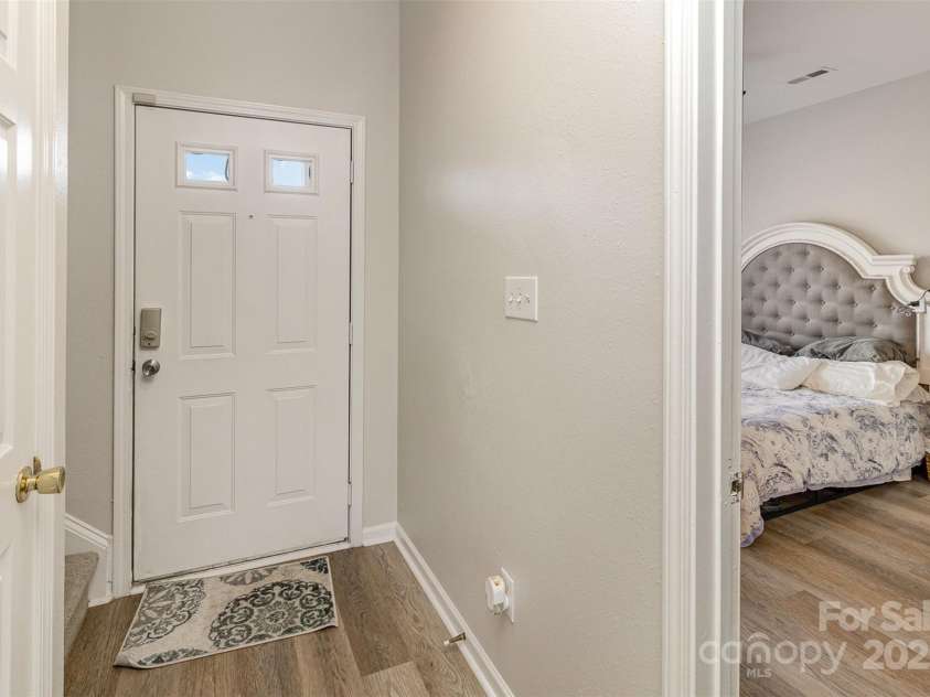 1751 Holliford Court, Charlotte, NC 28215.  MLS# CAR4227714, YatesRealty ID 9772. Hallway to Staircase