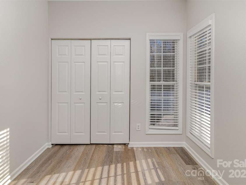 1751 Holliford Court, Charlotte, NC 28215.  MLS# CAR4227714, YatesRealty ID 9772. Kitchen view of closet with Washer + Dryer connections