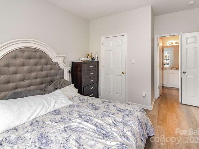 1751 Holliford Court, Charlotte, NC 28215.  MLS# CAR4227714, YatesRealty ID 9772. Primary Bedroom + Bathroom