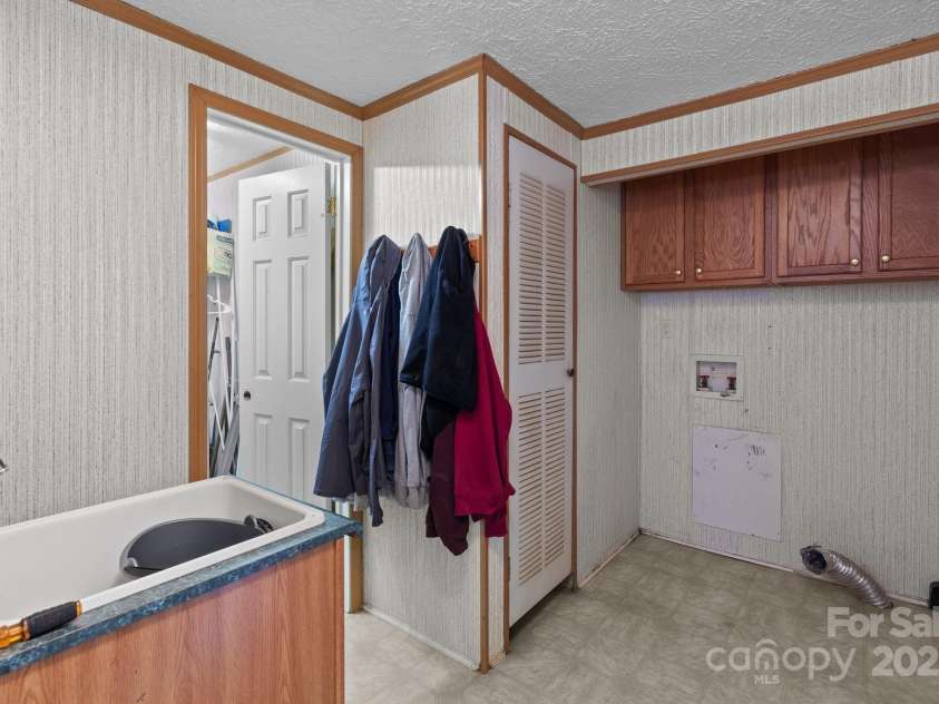 145 McCreek Drive, China Grove, NC 28023.  MLS# CAR4252985, YatesRealty ID 9777. Laundry area