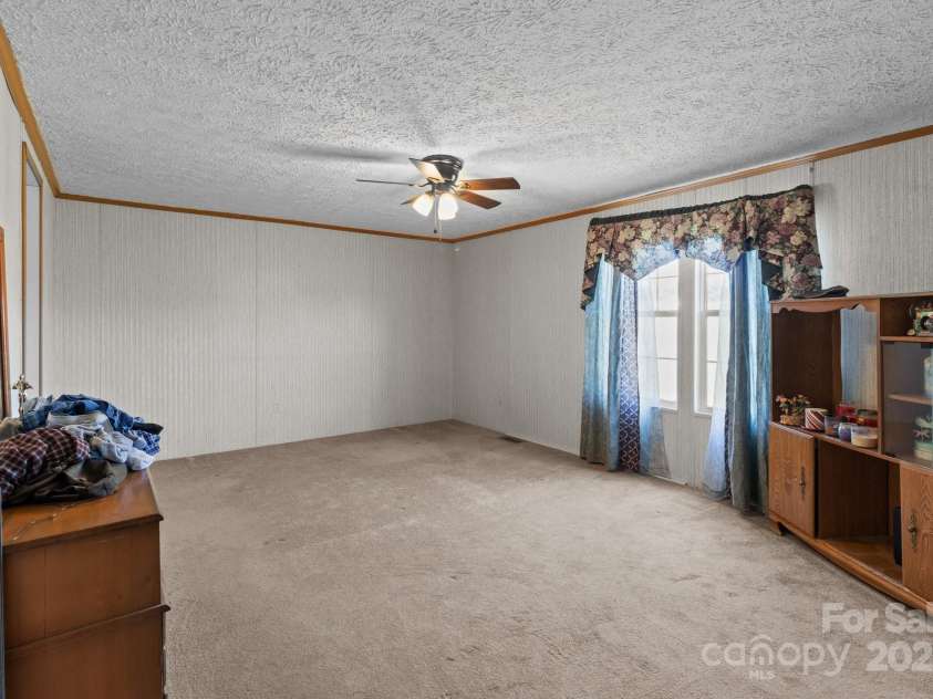 145 McCreek Drive, China Grove, NC 28023.  MLS# CAR4252985, YatesRealty ID 9777. Primary bedroom