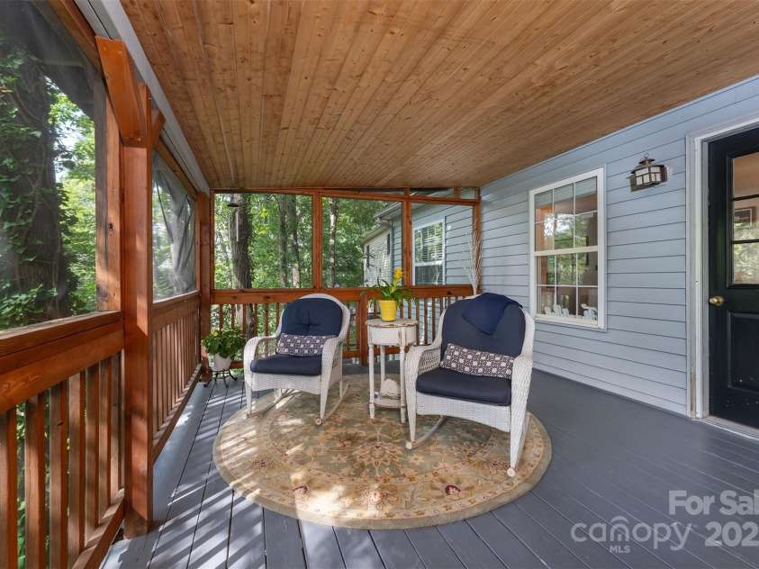 26 Foxberry Drive, Arden, NC 28704.  MLS# CAR4325945, YatesRealty ID 978. Screened back covered balcony. 