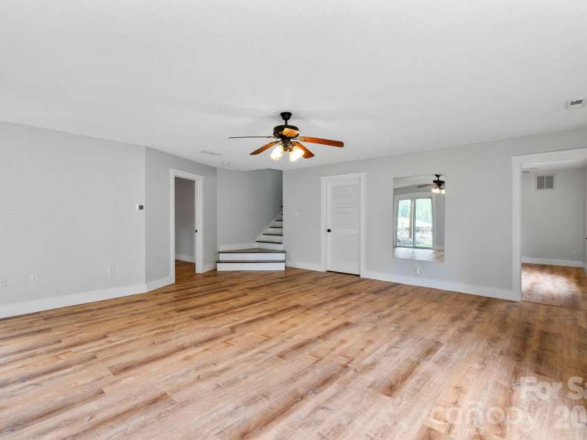 73 Creeks End Circle, Mills River, NC 28759.  MLS# CAR4365909, YatesRealty ID 9791. Light-filled Family Room