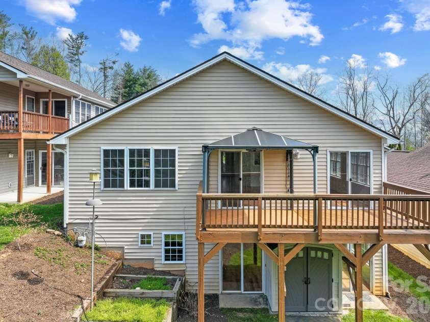 73 Creeks End Circle, Mills River, NC 28759.  MLS# CAR4365909, YatesRealty ID 9791. Storage Shed Under Deck