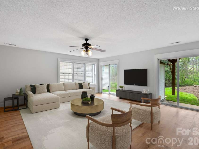 73 Creeks End Circle, Mills River, NC 28759.  MLS# CAR4365909, YatesRealty ID 9791. Virtually Staged Family Room