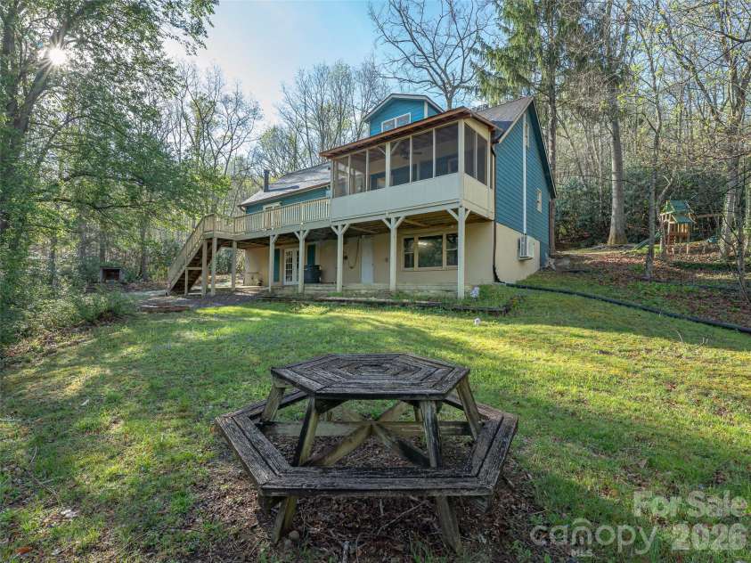 58 Pittman Road, Fletcher, NC 28732.  MLS# CAR4366277, YatesRealty ID 9798. Back yard