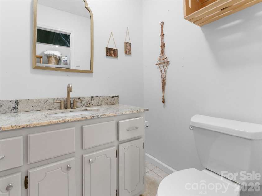 58 Pittman Road, Fletcher, NC 28732.  MLS# CAR4366277, YatesRealty ID 9798. Hall bath