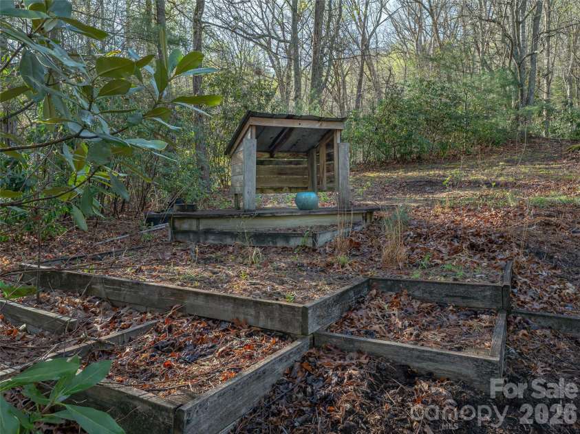 58 Pittman Road, Fletcher, NC 28732.  MLS# CAR4366277, YatesRealty ID 9798. Raised beds