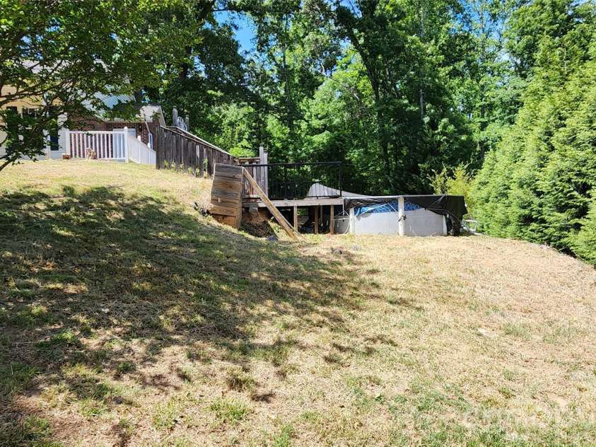 200 Park Place, Morganton, NC 28655.  MLS# CAR4367466, YatesRealty ID 9800. Above ground pool in right side yard