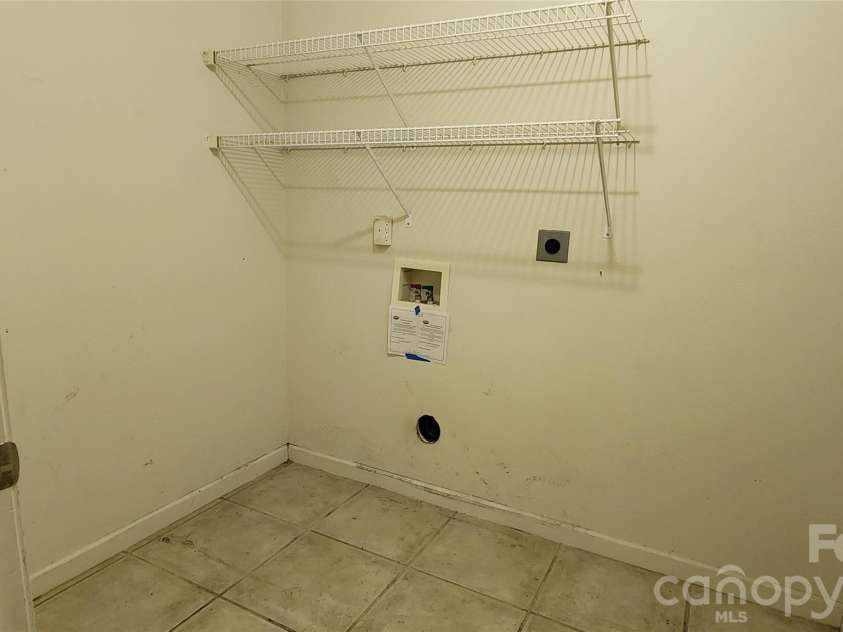 200 Park Place, Morganton, NC 28655.  MLS# CAR4367466, YatesRealty ID 9800. Laundry room in hallway