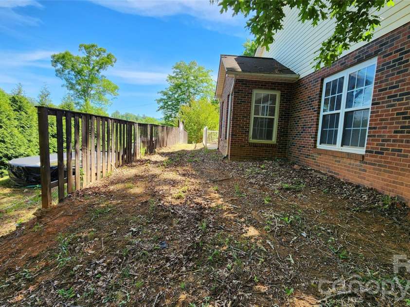 200 Park Place, Morganton, NC 28655.  MLS# CAR4367466, YatesRealty ID 9800. Right side elevation. Pool is located here. Access from side door to the pool.