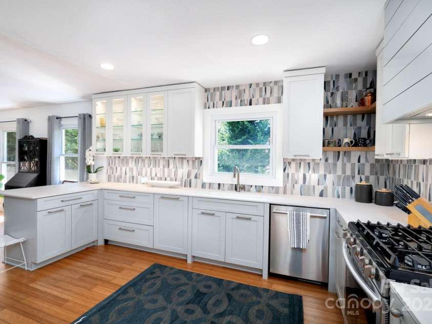 36 Brookcliff Drive, Asheville, NC 28804.  MLS# CAR4235948, YatesRealty ID 9808. Renovated Kitchen Features Honed Ceasarstone Countertops