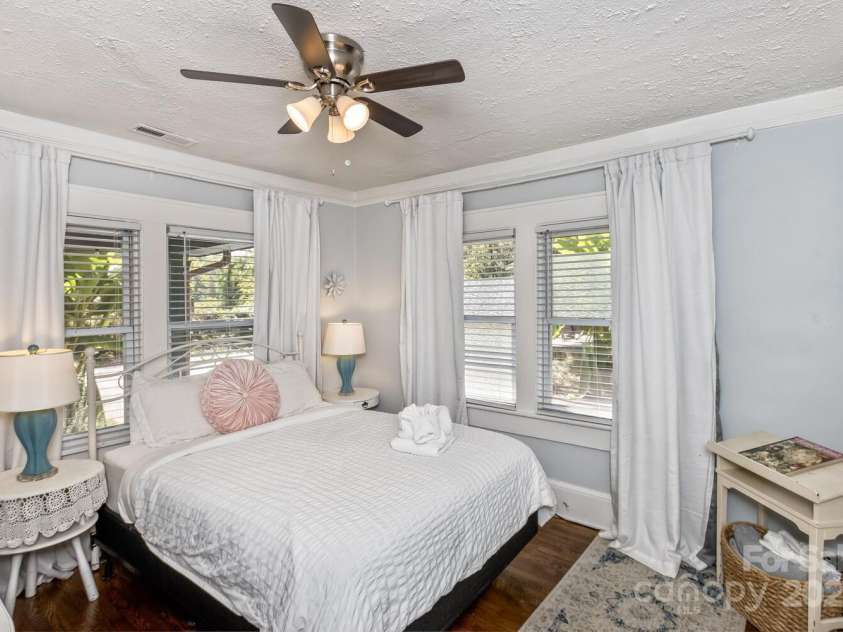 13 Norton Drive, Asheville, NC 28804.  MLS# CAR4309428, YatesRealty ID 9809. Light filled front bedroom 