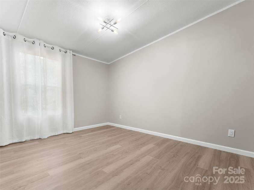 25 Overbrook Drive, Saluda, NC 28773.  MLS# CAR4306681, YatesRealty ID 981. Bedroom 2. 