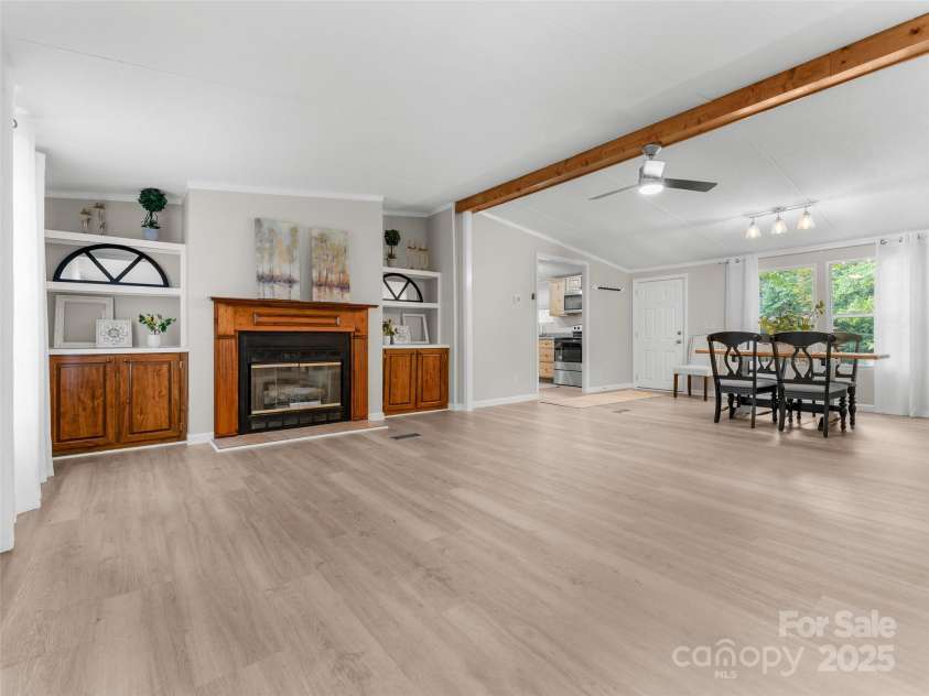 25 Overbrook Drive, Saluda, NC 28773.  MLS# CAR4306681, YatesRealty ID 981. Built in shelves and gas logs. 