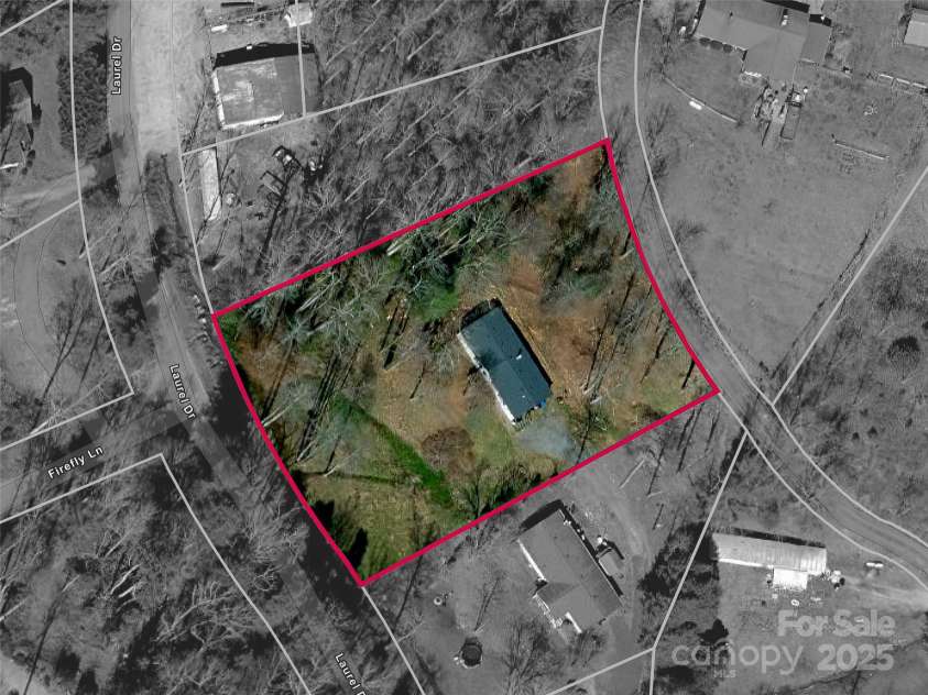 25 Overbrook Drive, Saluda, NC 28773.  MLS# CAR4306681, YatesRealty ID 981. Lot is .97 acre and borders Laurel Drive in front and Overbrook drive in the back. 