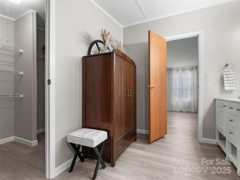 25 Overbrook Drive, Saluda, NC 28773.  MLS# CAR4306681, YatesRealty ID 981. Primary suite includes huge closet and spacious bathroom. 