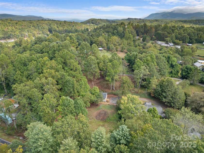 25 Overbrook Drive, Saluda, NC 28773.  MLS# CAR4306681, YatesRealty ID 981. This really is a spectacular area. Natural beauty, among the mountains. Peaceful and quiet, yet a walk or golf cart ride into downtown to enjoy the library, park, restaurants. Convenient to the interstate, but you'd never gu