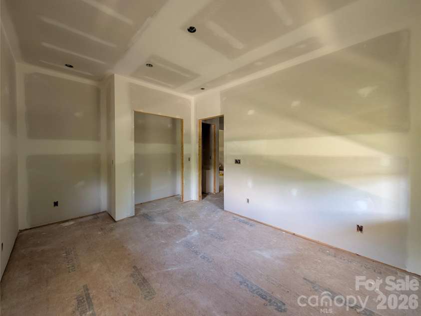 338 Majestic Mountain Drive, Burnsville, NC 28714.  MLS# CAR4277521, YatesRealty ID 981. 2nd Bedroom off from Great Room on main level