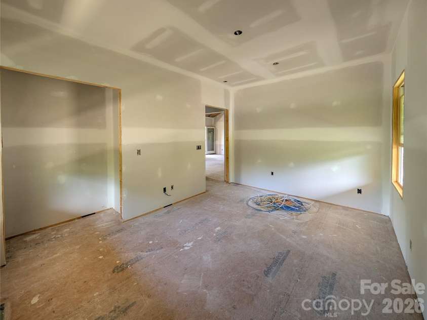 338 Majestic Mountain Drive, Burnsville, NC 28714.  MLS# CAR4277521, YatesRealty ID 981. Additional view of Bedroom off Great Room on main level