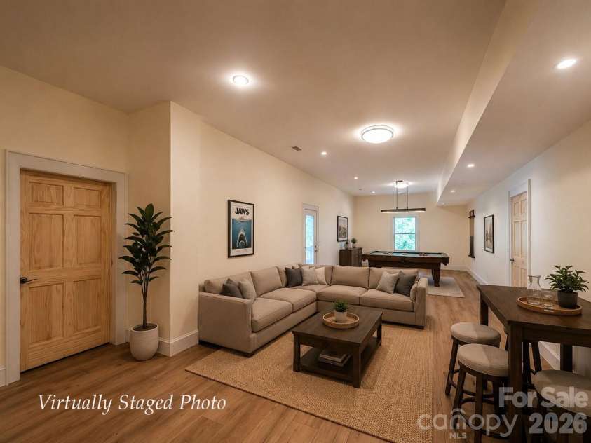 338 Majestic Mountain Drive, Burnsville, NC 28714.  MLS# CAR4277521, YatesRealty ID 981. Virtually Stage representation of downstairs flex-space