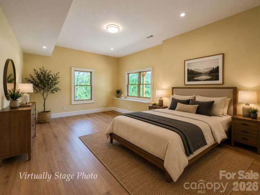 338 Majestic Mountain Drive, Burnsville, NC 28714.  MLS# CAR4277521, YatesRealty ID 981. Virtually Stage representation of fully finished downstairs bedroom