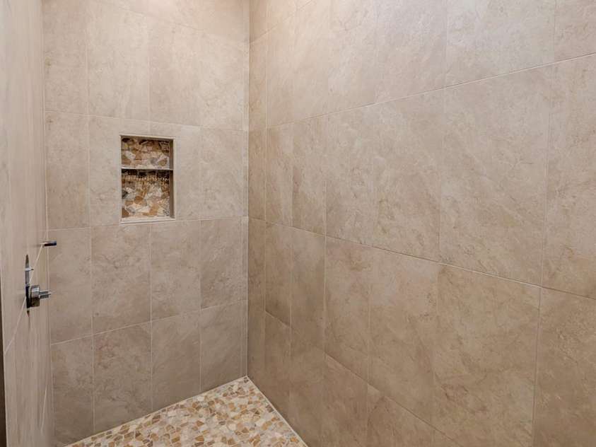338 Majestic Mountain Drive, Burnsville, NC 28714.  MLS# CAR4277521, YatesRealty ID 981. Walk In shower in en-suite bathroom