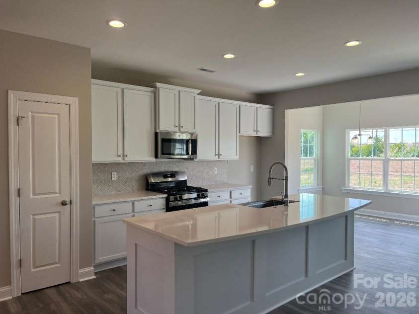262 Corrie Ann Drive, Concord, NC 28027.  MLS# CAR4402498, YatesRealty ID 9812. Gourmet Kitchen w/Oversized Kitchen Island