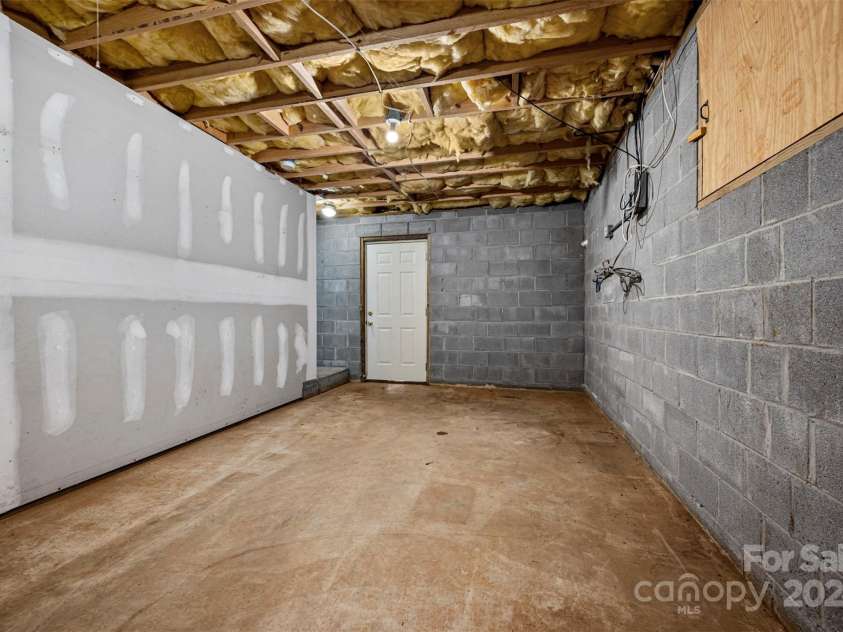 147 Tara Place, Forest City, NC 28043.  MLS# CAR4170856, YatesRealty ID 9813. Basement Storage