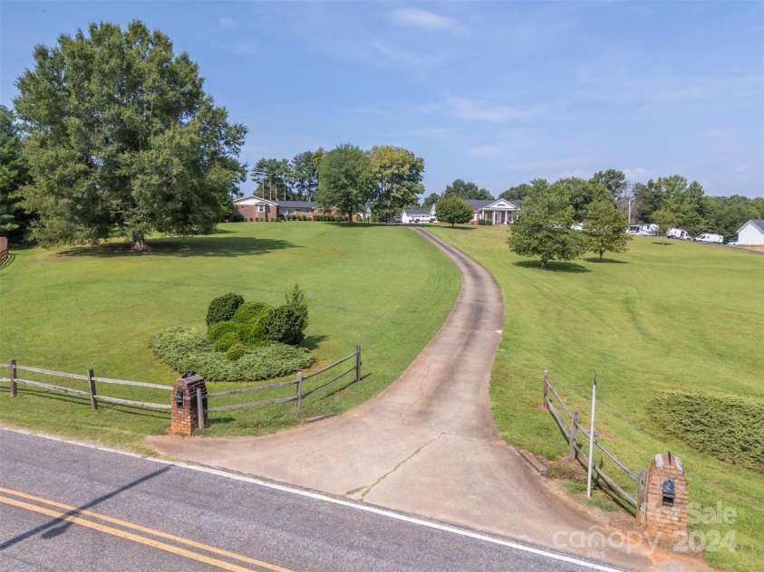 147 Tara Place, Forest City, NC 28043.  MLS# CAR4170856, YatesRealty ID 9813. Driveway to Home