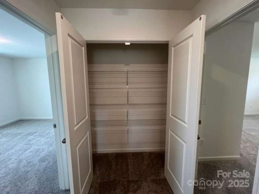 12131 Plummer Court, Midland, NC 28107.  MLS# CAR4216972, YatesRealty ID 9814. Extra Linen Closet