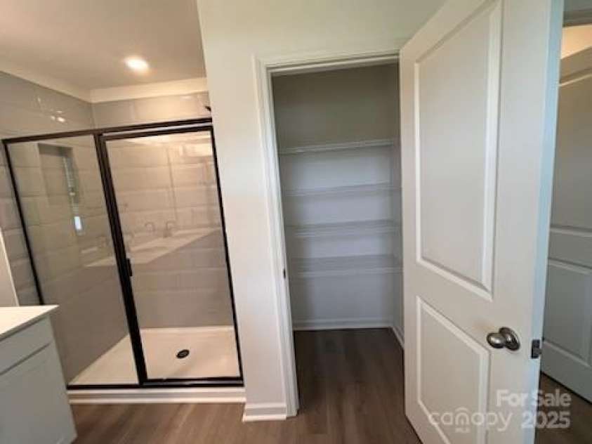 12131 Plummer Court, Midland, NC 28107.  MLS# CAR4216972, YatesRealty ID 9814. Primary Bathroom Linen Closet