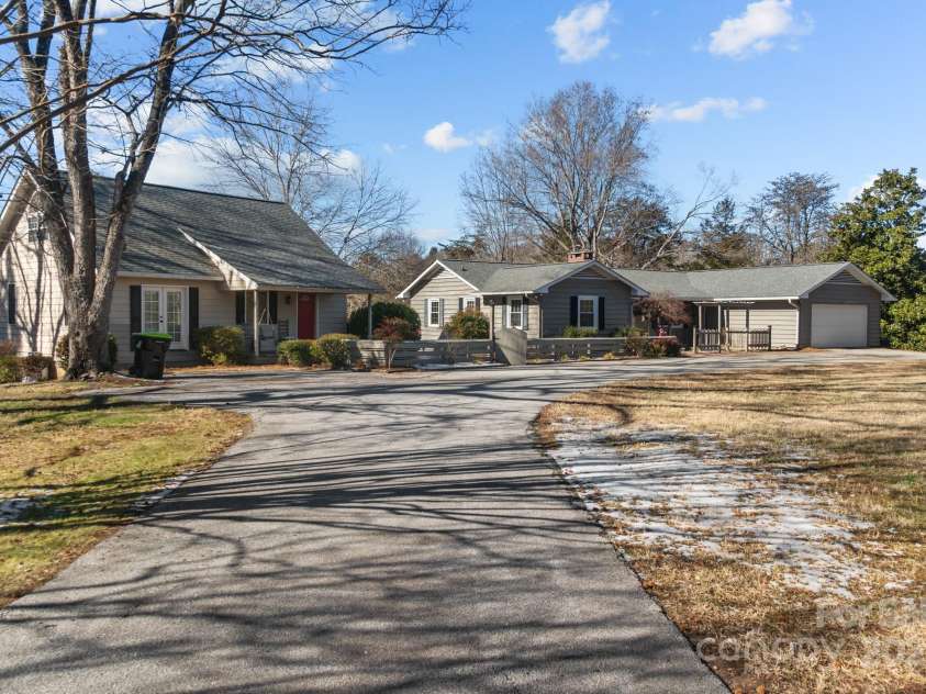 705 Hooper Creek Road, Tryon, NC 28782.  MLS# CAR4214441, YatesRealty ID 9818. 