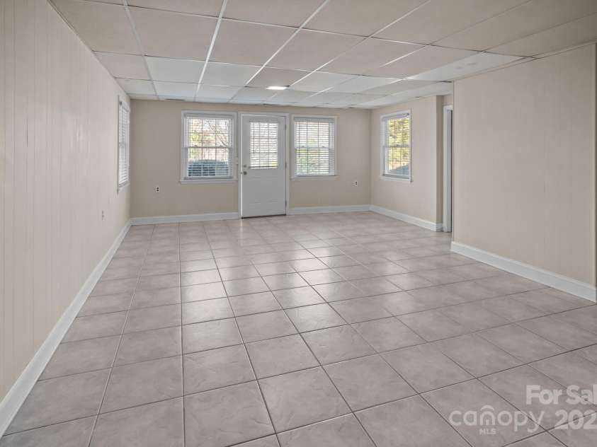 705 Hooper Creek Road, Tryon, NC 28782.  MLS# CAR4214441, YatesRealty ID 9818. 