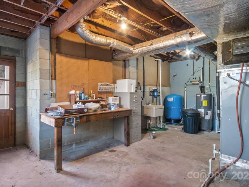 705 Hooper Creek Road, Tryon, NC 28782.  MLS# CAR4214441, YatesRealty ID 9818. 