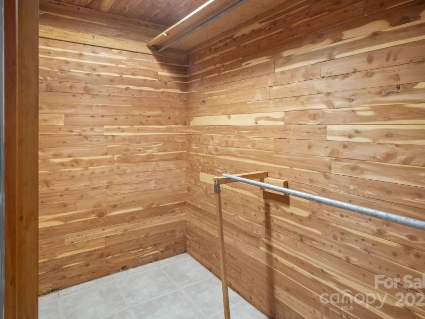 705 Hooper Creek Road, Tryon, NC 28782.  MLS# CAR4214441, YatesRealty ID 9818. 