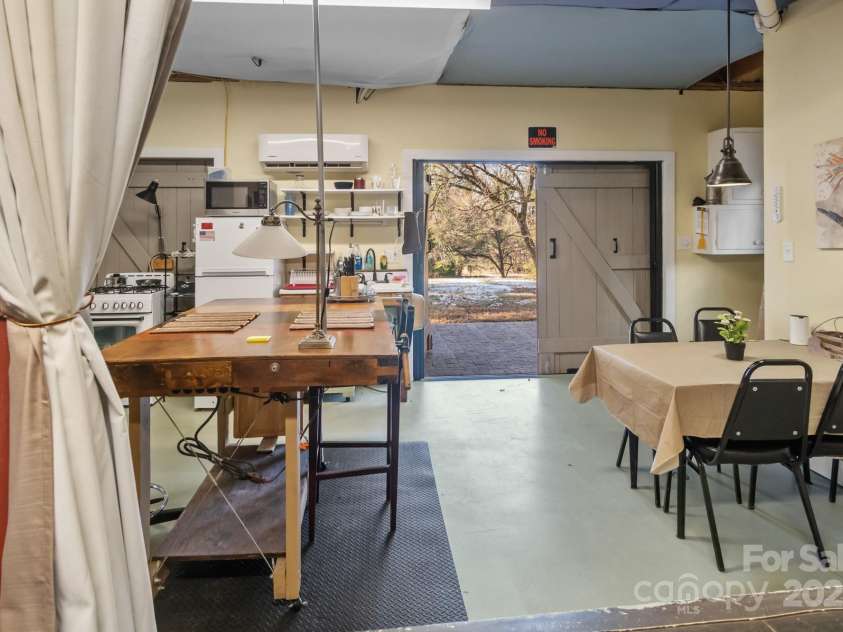 705 Hooper Creek Road, Tryon, NC 28782.  MLS# CAR4214441, YatesRealty ID 9818. 