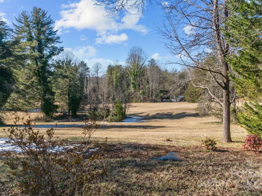 705 Hooper Creek Road, Tryon, NC 28782.  MLS# CAR4214441, YatesRealty ID 9818. 