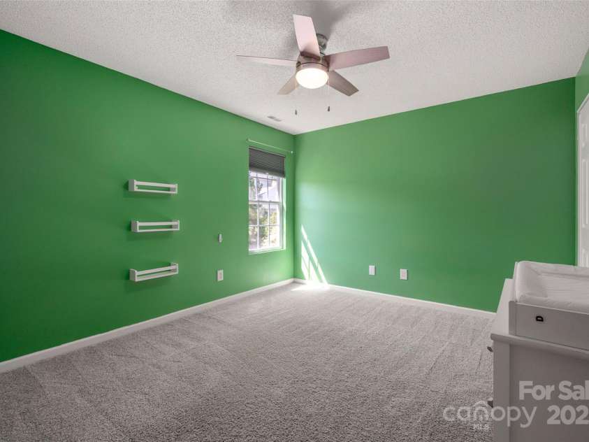 6934 Tanners Creek Drive, Huntersville, NC 28078.  MLS# CAR4303299, YatesRealty ID 9819. Bedroom #4 with new ceiling fan