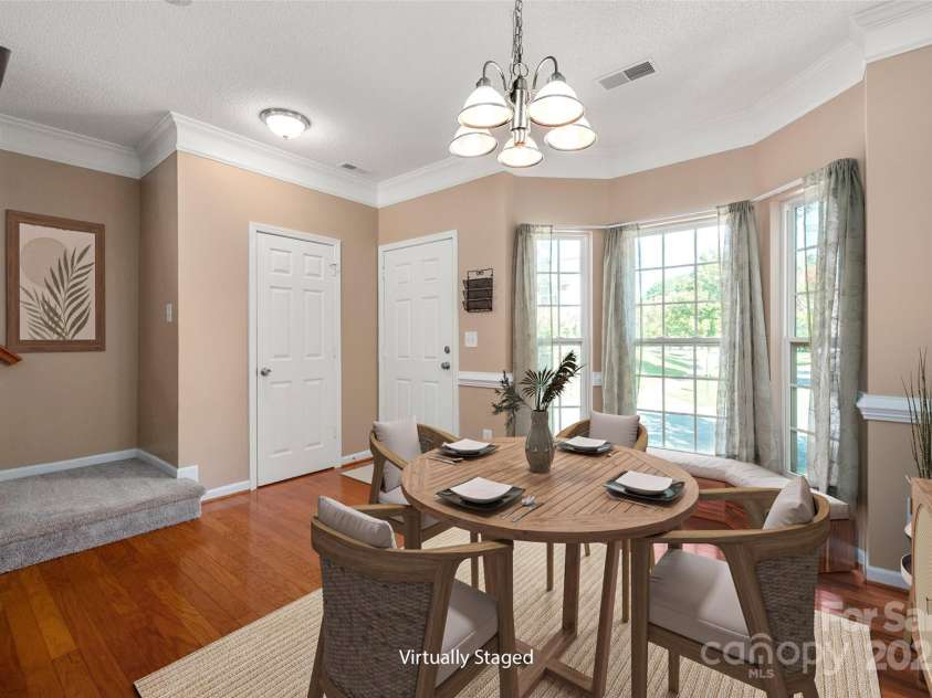 6934 Tanners Creek Drive, Huntersville, NC 28078.  MLS# CAR4303299, YatesRealty ID 9819. Dining area with Bay window - Virtually staged