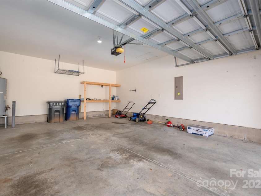 6934 Tanners Creek Drive, Huntersville, NC 28078.  MLS# CAR4303299, YatesRealty ID 9819. Full 2 car garage with extended workspace area