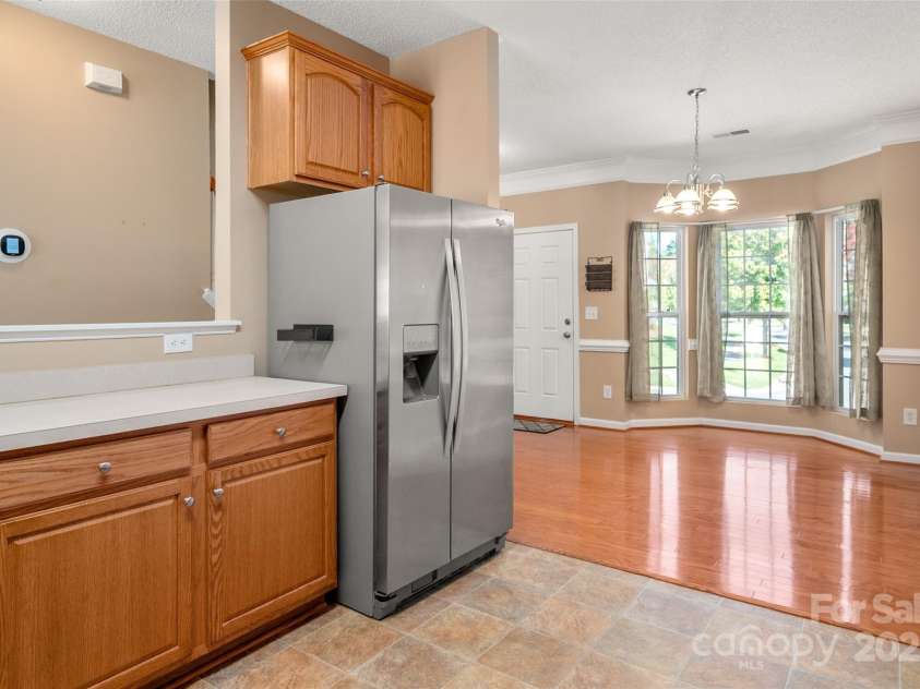 6934 Tanners Creek Drive, Huntersville, NC 28078.  MLS# CAR4303299, YatesRealty ID 9819. Large, open Kitchen with Stainless Steel appliances