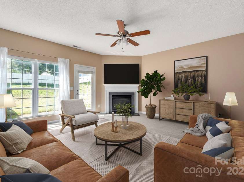 6934 Tanners Creek Drive, Huntersville, NC 28078.  MLS# CAR4303299, YatesRealty ID 9819. Living Room with views of the open back yard