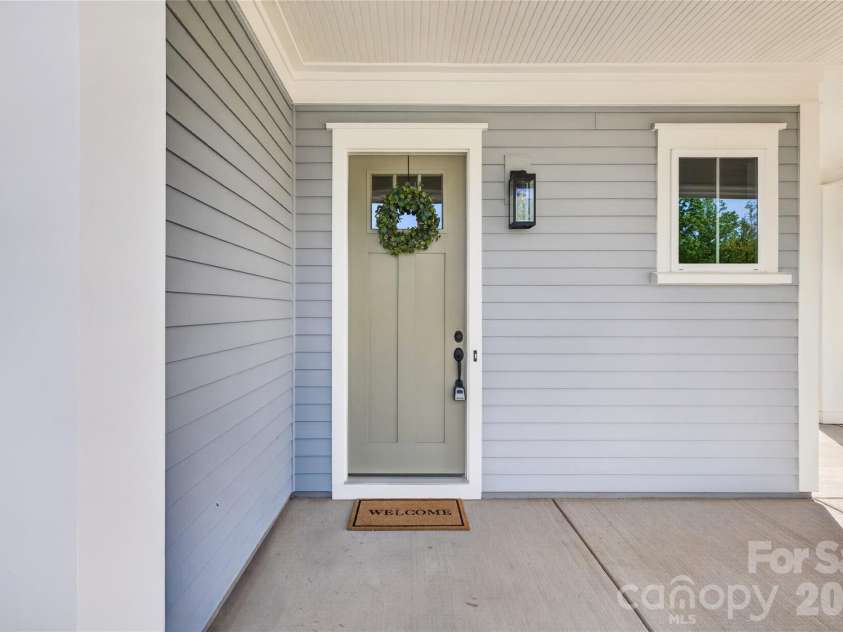 7245 Westrow Avenue, Charlotte, NC 28278.  MLS# CAR4314661, YatesRealty ID 982.  A front porch perfect for rocking chairs!