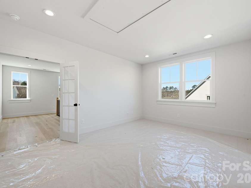 7245 Westrow Avenue, Charlotte, NC 28278.  MLS# CAR4314661, YatesRealty ID 982. Bonus room featuring glass French doors - a perfect space for a home office, playroom our guest suite.