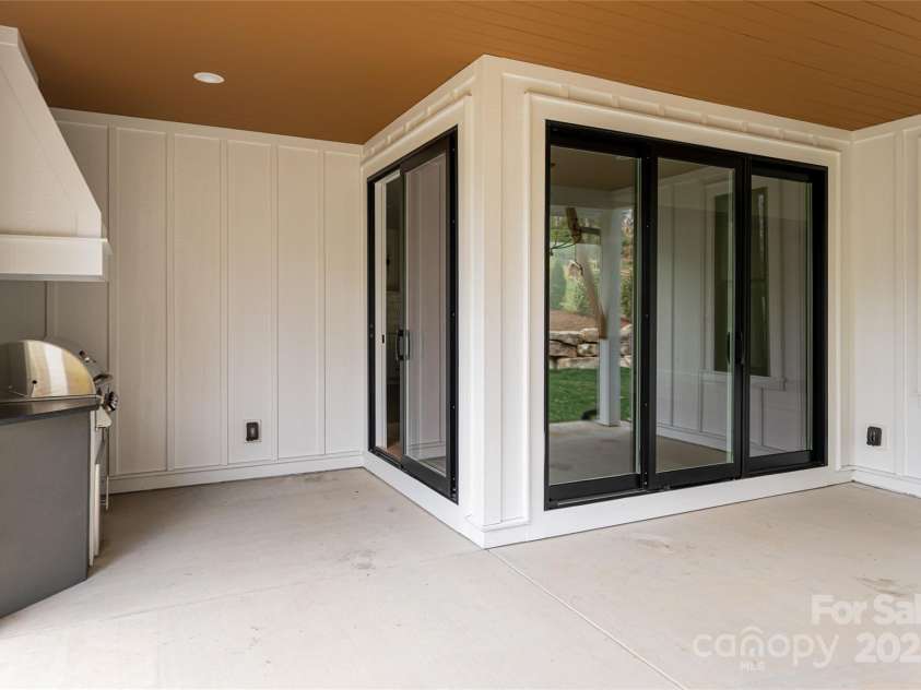 251 Bee Tree Road, Swannanoa, NC 28778.  MLS# CAR4238018, YatesRealty ID 9826. Covered back porch