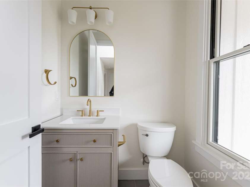 251 Bee Tree Road, Swannanoa, NC 28778.  MLS# CAR4238018, YatesRealty ID 9826. Powder bathroom
