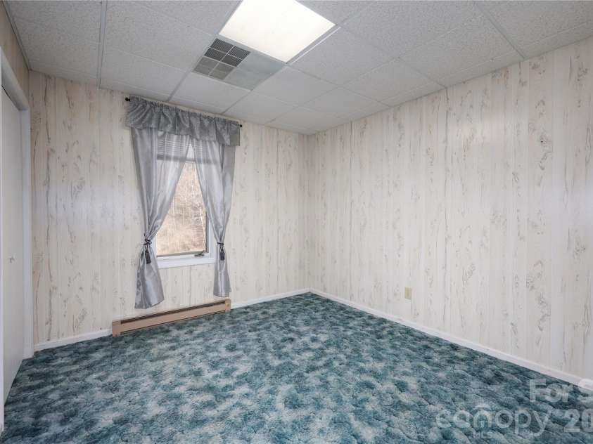 682 Cecil Street, Thomasville, NC 27360.  MLS# CAR4411361, YatesRealty ID 9827. Basement bedroom