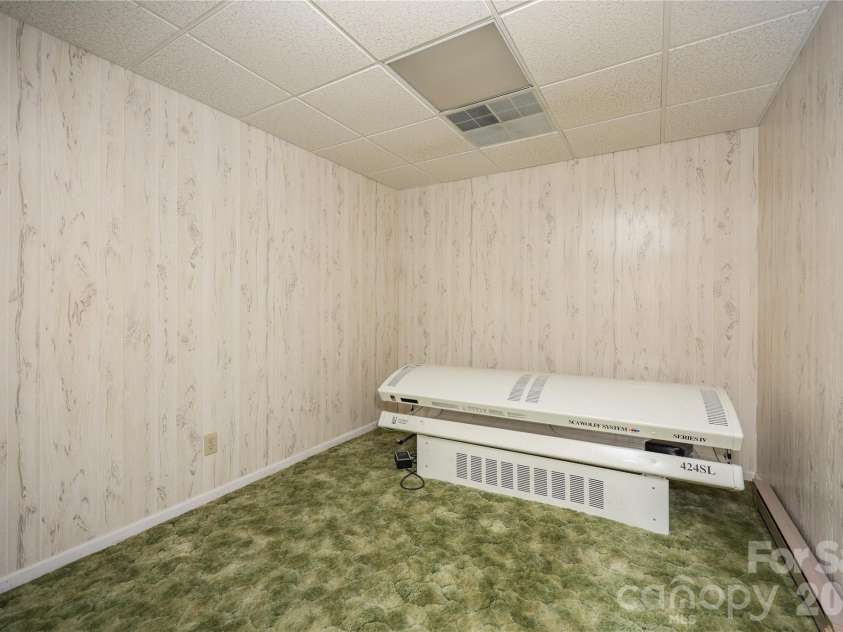 682 Cecil Street, Thomasville, NC 27360.  MLS# CAR4411361, YatesRealty ID 9827. Basement room