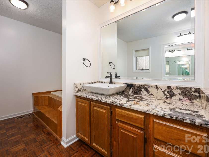 682 Cecil Street, Thomasville, NC 27360.  MLS# CAR4411361, YatesRealty ID 9827. Primary bath, granite countertops